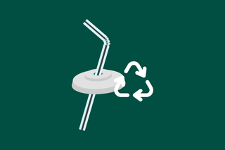 Hand holding recycling sign