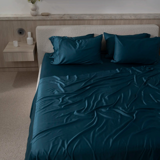 Cooling Bamboo Flat Sheet in Reef Teal, on a made bed