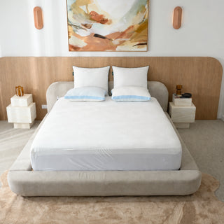 European pillows on a made bed