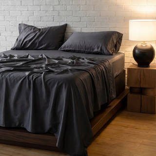 Fur-friendly Bamboo Flat Sheet in Charcoal, on a made bed