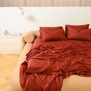 Burgundy fur-friendly bamboo sheet set, low45 view