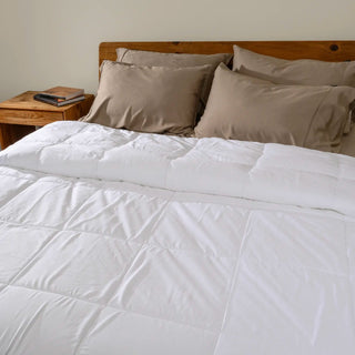Midweight mid-season quilt on a made bed